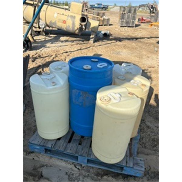 Pallet of plastic barrels