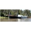 Image 1 : Barge Unit ! - blue landing barge- located south of Fort Liard