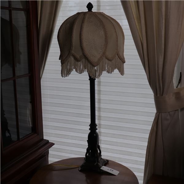 Vintage Table Lamp with Ornate Base and Scalloped Fabric Shade