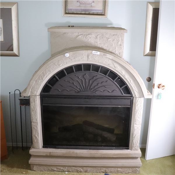 Dimplex electric fireplace with arched faux-stone surround and integrated stereo, c. 2000–2