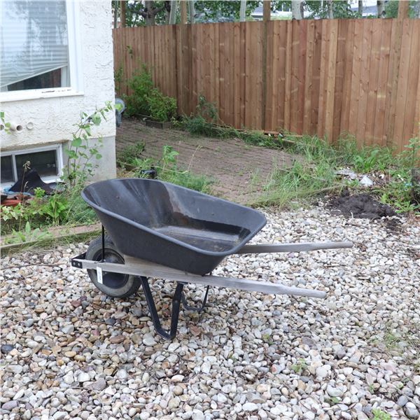 Plastic tray and wood-handled single-wheel wheelbarrow