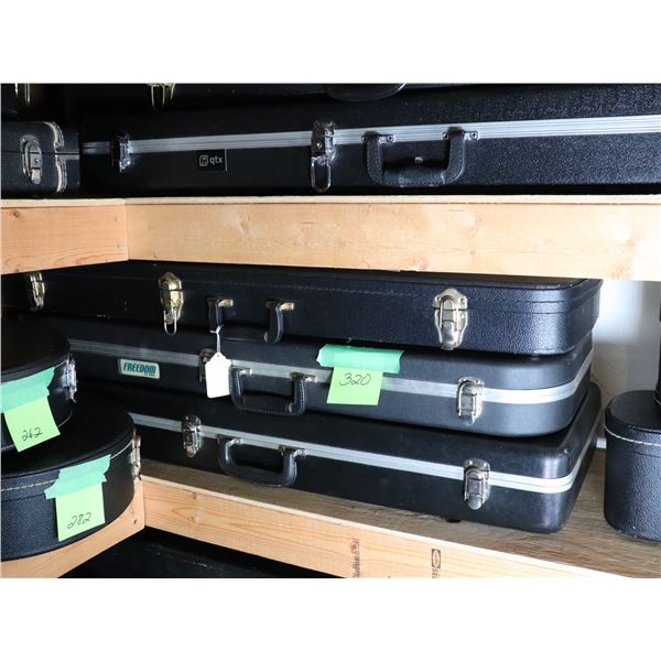 Set of Three Black Hard Shell Guitar Cases, "qtx" and "FREEDOM" Branded