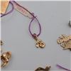 Image 8 : Assorted Estate Gold Charms, Pendants, Bangle, and Earring Group