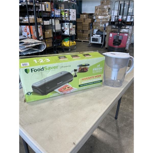 FOODSAVER VACUUM SEALER AND A WATER PITCHER