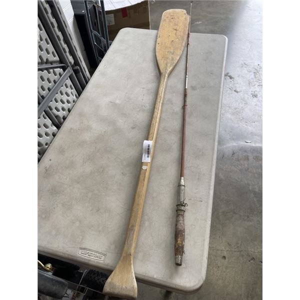 VINTAGE PADDLE AND FISHING ROD
