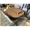 Image 2 : VINTAGE OVAL TABLE AND 4 SWIVEL CHAIRS