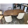 Image 3 : VINTAGE OVAL TABLE AND 4 SWIVEL CHAIRS