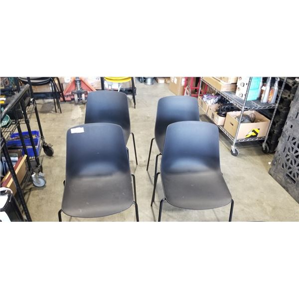 4 BLACK STACKING CHAIRS