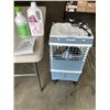 Image 1 : EVOPORATIVE AIR COOLER W/ 2 JUGS OF TREATMENT - WORKING