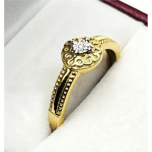 GOLD PLATED STERLING SILVER NATURAL DIAMOND (0.01CT) RING, SIZE 8, W/A $550.00. DIAMOND IS THE BIRTH