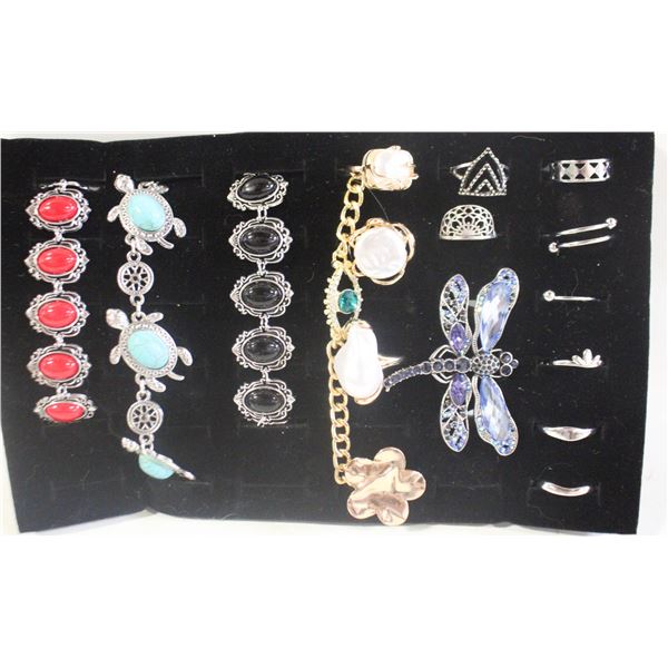 TRAY W/ BROOCH AND BRACELETS AND  RINGS