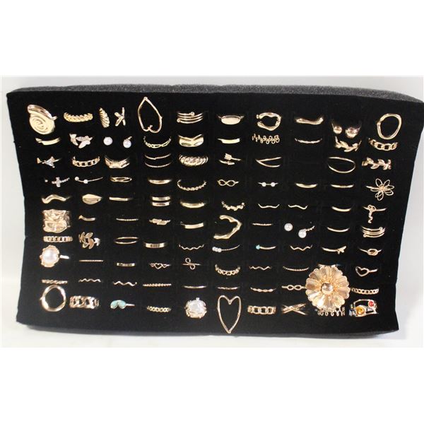 TRAY W/100 GOLDTONE RINGS
