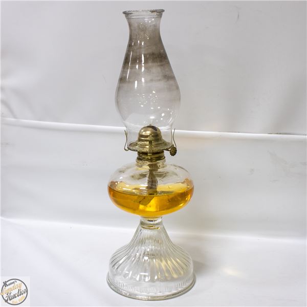ANTIQUE OIL LAMP 18 INCHES TALL WITH OIL INSIDE