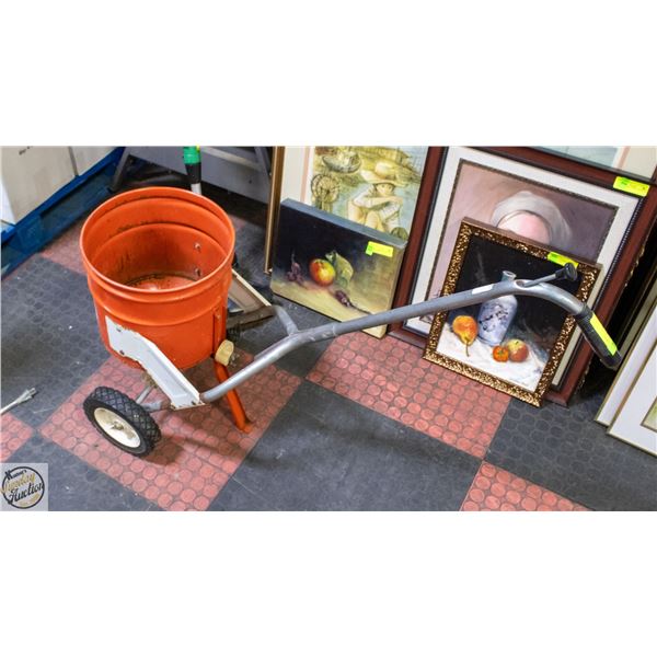 VINTAGE ORANGE FERTILIZER SPREADER