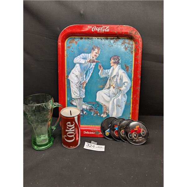 A Vintage Collectible Coca Cola Lot Old Tray ,Coasters , Pop Can etc