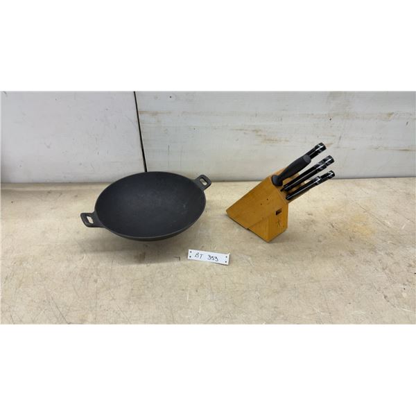 Cast Iron Wok and J.A. Henckels International 6-Piece Knife Set with Block and Sharpening Steel.