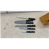 Image 5 : Cast Iron Wok and J.A. Henckels International 6-Piece Knife Set with Block and Sharpening Steel.