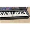 Image 7 : Casio LK-30 100 Song Bank Keyboard with Key Lighting System and Keyboard Stand. No power cord
