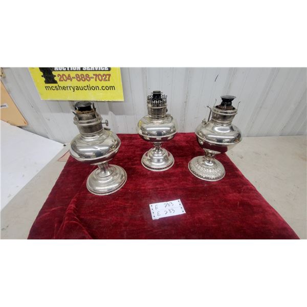 Three Antique Silver-Plated Aladdin Kerosene Oil Lamps with Ornate Bases