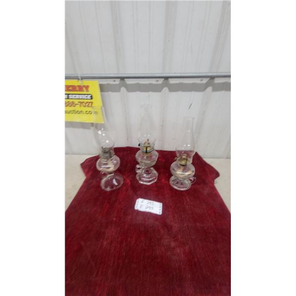 Set of Three Vintage Clear Pressed Glass Kerosene Finger Lamps with Handles and Glass Chimneys