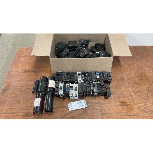 Box of Assorted Circuit Breakers and Baldor Capacitors