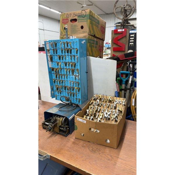 Curtis Industries Key Duplicator Machine, Key Blank Display Board, and Box of Key Blanks