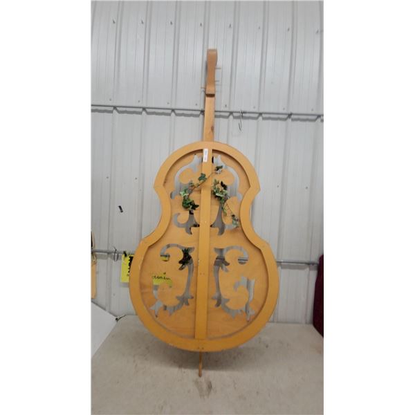 Decorative Wooden Cello Prop with Ornate Cutouts and Artificial Ivy Foliage 7' tall