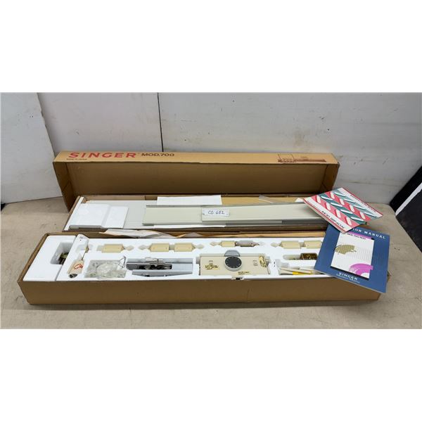 Singer Mod. 700 Home Knitter, with Manuals, Yarn, Sewing Handle, and Accessories
