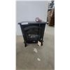 Image 1 : Black Electric Fireplace Stove with Faux Log Flame Effect and Glass Door