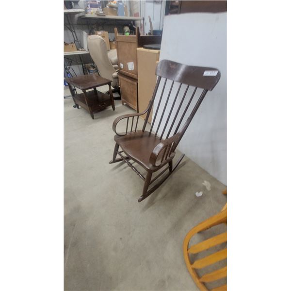 Wooden Spindle-Back Rocking Chair with Curved Armrests and Dark Brown Finish