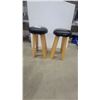 Image 1 : Pair of Bar Stools with Round Black Padded Seats, Wooden Legs, and Metal Footrests