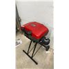 Image 1 : Coleman RoadTrip LXE Portable Propane Grill, Red and Black, with Stand and Wheels