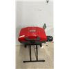 Image 2 : Coleman RoadTrip LXE Portable Propane Grill, Red and Black, with Stand and Wheels