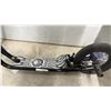 Image 5 : Mongoose Black and Blue Scooter with Skull Deck, Front and Rear Brakes, and Blue Spokes