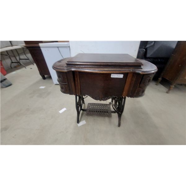 Antique Singer Improved Family Treadle Sewing Machine in Carved Wood Cabinet, Late 19th Century