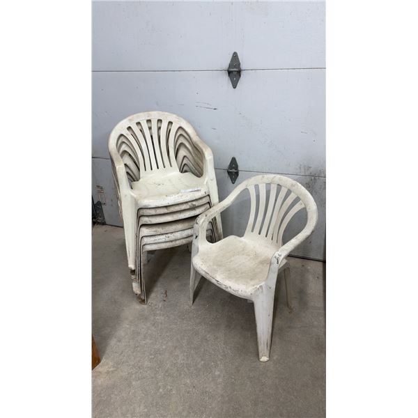Stack of (7) White Plastic Patio Chairs
