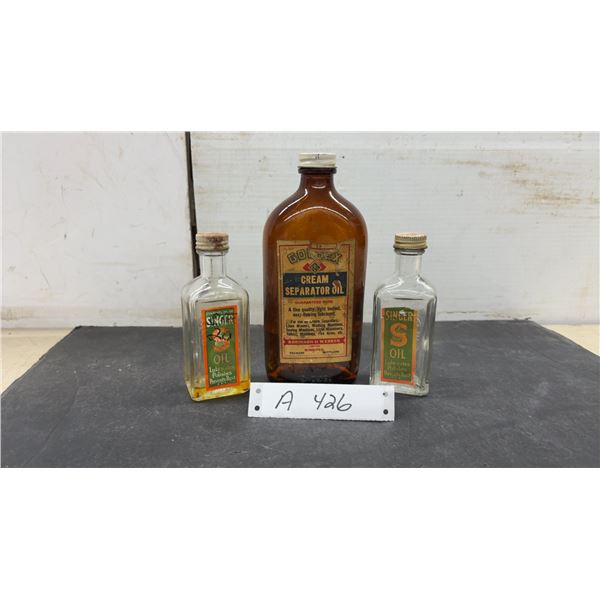 Vintage Singer Sewing Machine Oil 3 Fluid Ounce Bottles and Goldex Cream Separator Oil Bottle