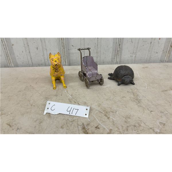 Hubley Cast Iron Boston Terrier Bank, Doll Carriage, and Lady Bug Bank