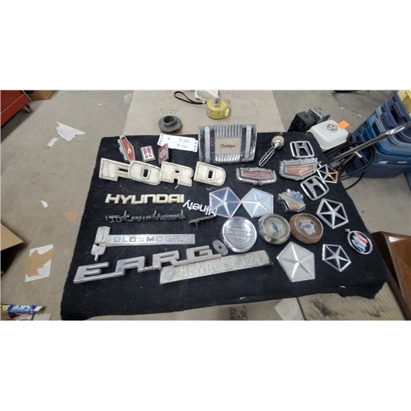 Vintage Automotive Emblems Including Ford, Hyundai, Oldsmobile, Chrysler, Dodge, Lincoln