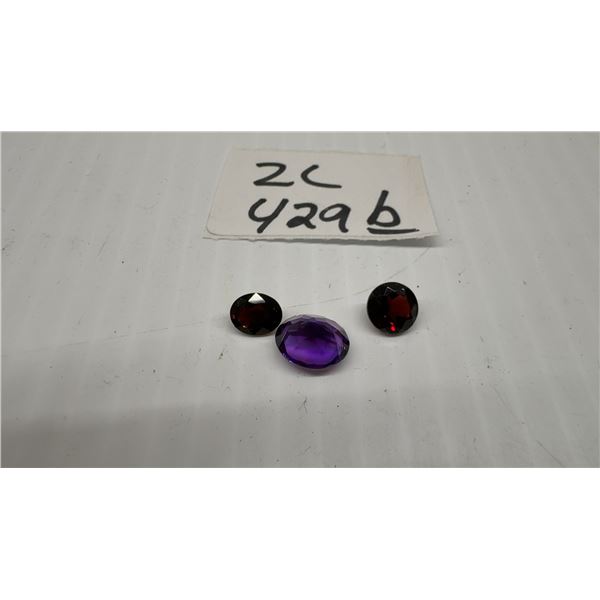 Natural Gemstone Lot: 1.15ct Oval Orange Tourmaline and 3.59ct Oval Purple Amethyst and 2.18
