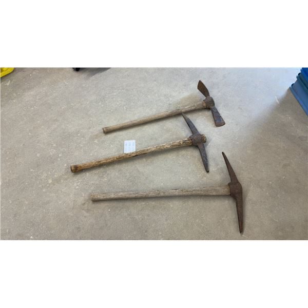 Lot of Three Vintage Pickaxes with Rusted Metal Heads and Wooden Handles