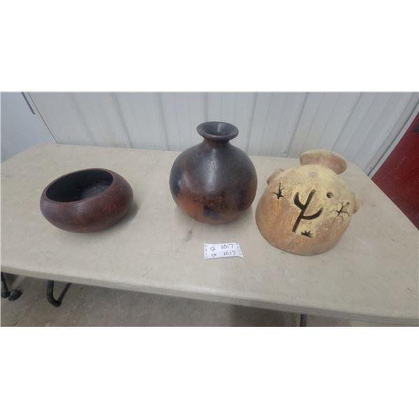Handcrafted Pottery Lot: Carved Face Jar, Dark Globular Vase, and Reddish-Brown Bowl