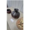 Image 4 : Handcrafted Pottery Lot: Carved Face Jar, Dark Globular Vase, and Reddish-Brown Bowl