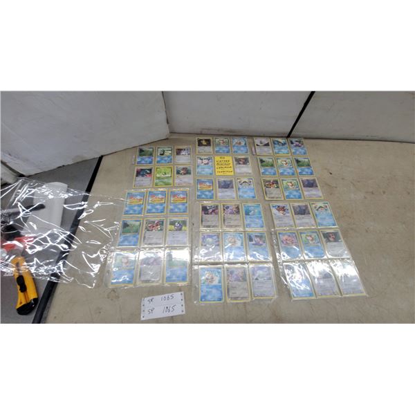 Collection of 50 Vintage Pokémon Trading Cards in Plastic Protector Sheets