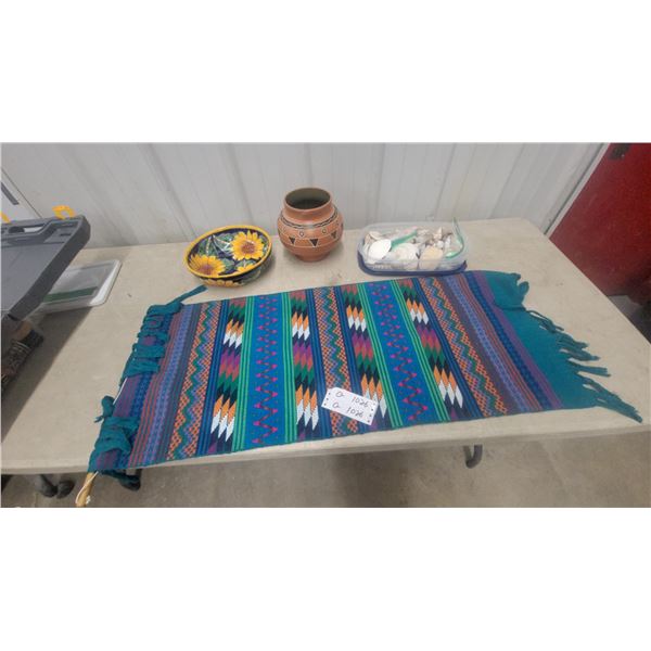 Woven Southwestern Textile Runner, Talavera Sunflower Bowl, Clay Pot, and Seashells