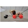 Image 2 : Vintage Fisher-Price Little Snoopy Pull Toy Model #690 with Red Wheels and Green-Tipped Pull Cord