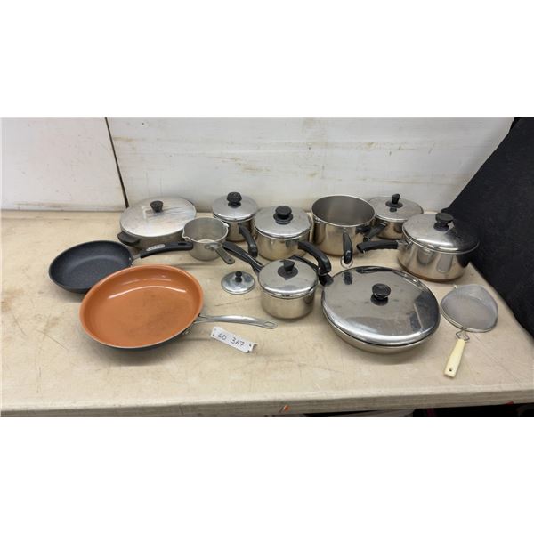 Assortment of Cookware Including T-Fal Non-Stick Frying Pan, Stainless Pots with Lids