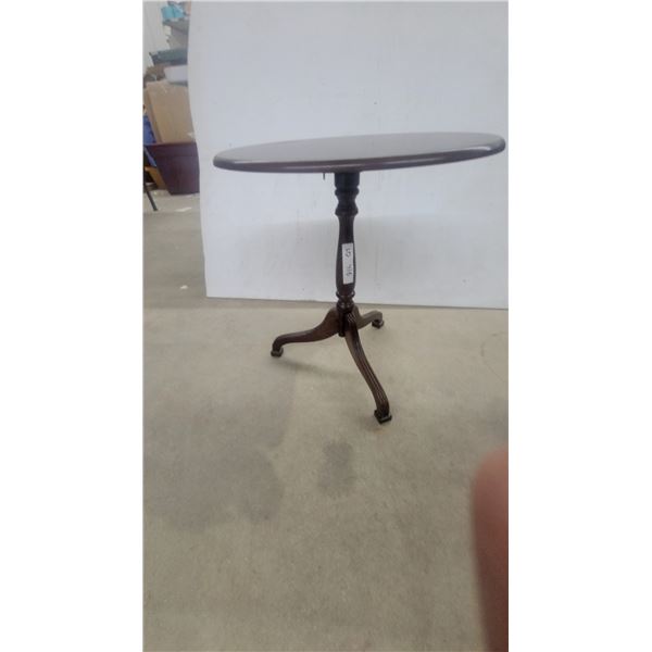 Dark Wood Tilt-Top Pedestal Table with Oval Top and Three Splayed Legs 21”×19” x 14”