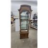 Image 1 : Curved Top Display Cabinet with Glass Shelves and Two Drawers 24”×69”×12” lights up