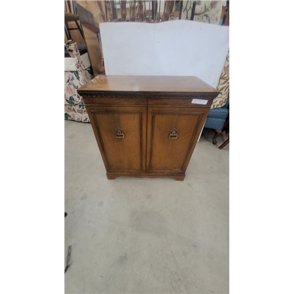Traditional Two-Door Wooden liquor cabinet with Carved Frieze and Brass Ring Pulls 34”×31”×16”